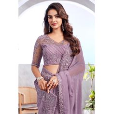 Lavender colored saree is prettified with sequins floral embroidered work as shown which makes it appear classy. This saree is made of Georgette fabric which is accompanied with banglori silk blouse piece which you can customise as per your design/style. Women can buy this saree to wear for their parties, reception and events. Note:- The actual product may differ slightly in color and design from the one illustrated in the images when compared with computer or mobile screen. Measurements: Saree Lavender Floral, Mobile Screen, Georgette Saree, Georgette Fabric, Lavender Color, Georgette Sarees, Style Women, Blouse Piece, Surprise Gifts