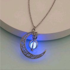 Brand New Super Cute Rare Glowing Luminous Crescent Moon Necklace! (Charges Best In Natural Sunlight, Glows Best In Dark) Alloy Metal Silver Moon-shaped Jewelry For Party, Silver Moon Shaped Jewelry For Party, Silver Moon-shaped Party Jewelry, Luminous Silver Jewelry For Party, Silver Moon-shaped Magical Necklace, Blue Moon-shaped Metal Jewelry, Celestial Silver Necklace For Party, Silver Celestial Necklace For Party, Silver Celestial Party Necklace