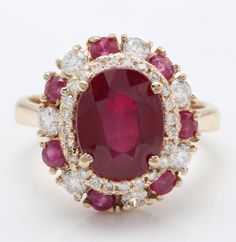 4.90 Carat Natural Red Ruby and Diamond Women Ring Made in 14K Solid Yellow Gold Suggested Retail Price $5,999.00 Total Natural Ruby Weight is - 3.90 Carat Ruby Measurements are - 10.00 x 8.00 mm Total Diamonds Carat Weight is - 1.00 Carat Clarity: SI1 Color: G-H Diamond Cut - Very Good RING SIZE: 6 (FREE SIZING AVAILABLE) RING WEIGHT IS 4.5 gram Disclaimer: All colors, measurements and weights are approximate and may vary slightly from the listed dimensions or as seen in the image''