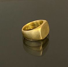 18k solid gold Signet Ring, 18k gold Square Statement Ring, Handmade, Fine Jewelry, Unisex gold signet ring Resizable. Available in 14k solid Gold & silver Size 13.5 US size 6.5 Weight 14.8g Square top 11 mm \ 16 mm (Please contact me for a different size or metal and the Price) Free Shipping! You are welcome to visit my shop for more of my designs: https://www.etsy.com/shop/GoldArtJewelry More Rings: https://www.etsy.com/shop/GoldArtJewelry Please take a moment to read my shop policies befo Gold Dome Ring With Smooth Bezel In 14k Gold, Modern Gold Signet Ring Stamped 14k, Luxury Yellow Gold Signet Ring With Smooth Bezel, Formal 22k Gold Ring Engraved, Gold Signet Ring In Recycled Gold For Formal Occasions, Luxury Signet Ring With Smooth Bezel As Gift, Formal Gold Signet Ring In Recycled Gold, Modern Yellow Gold Recycled Signet Ring, Luxury Ring With Smooth Bezel For Gift