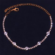 A fine addition to your collection, this charming anklet is the perfect accessory for a beach wedding. Crafted from good quality zinc alloy, this gorgeous piece is studded with square cut cubic zirconia crystals that give it a dazzling look. Ideal to wear when barefoot or with pretty sandals, this dainty piece of jewelry will give your bridal attire a fun new twist. Order this fancy leg chain now!Specifications Style: TRENDY Shape\pattern: Geometric Origin: CN(Origin) Model Number: Liang-122 Met Rhinestone Anklet, Leg Chain, Pretty Sandals, Ankle Jewelry, Women Anklets, Writing Gifts, Foot Jewelry, Anklet Bracelet, Anklet Jewelry