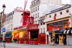 Moulin Rouge is an iconic cabaret in Paris, on Boulevard de Clichy, at Place Blanche, Paris, France Moulin Rouge Show, Paris Cabaret, Moulin Rouge Paris, Cabaret Show, City Of Paris, Roller Skaters, Paris Trip, Beautiful Streets, Visit Paris