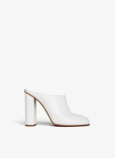 ALAÏA Women's Nude BABYLONE MULES IN CALFSKIN | ALAÏA US Crazy Horse Paris, Paris Summer, Corset Belt, Rubber Heels, Small Leather Goods, Autumn Summer, Mini Bag, Calf Skin, Bags Handbags