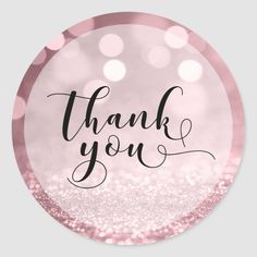 pink glitter thank you sticker with the words, thank you in cursive font