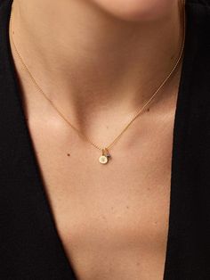 The stars have aligned in this celestial-inspired gold pendant necklace. Crafted in solid gold, this waterproof and tarnish-free set features a dainty gold ball chain with two charms--one gold star charm with a lab-grown diamond and one mini birthstone charm with a sapphire gemstone. Tie your look together with the perfect pop of color and pair this set with our Gold Huggie Hoops for a timeless finishing touch. The Gold Midnight Star Necklace includes three pieces: Dainty Gold Necklace - Gold Ball Chain Necklace, Gold Pendant - Gold Star Charm, & Birthstone - Gold Mini Birthstone Charm. • Crafted in recycled solid gold • Set of one necklace & two charms • Lab-grown diamond & sapphire gemstone Ball Chain Necklace Gold, Small Pendant Necklace, Simple Gold Necklace, Gold Ball Chain, Necklace Gold Pendant, Diamond Charm Necklace, Dainty Gold Chain, Gold Necklace Simple, Mini Necklace