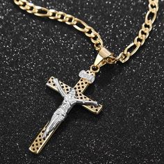 Take a moment to look at this marvelous pendant necklace handcrafted from gold plated 316L stainless steel. It showcases three-dimensional pendant in a figure of a Christian cross with one of a kind hollow diamond-shaped holes. It showcases a beautiful image of Jesus Christ in silver color. It is designed to be pressure and tough resistant by excellent professional jewelers and highly polished to achieve its desired durability.  Product highlights:   Delicately designed interlocking chain  Comfo Gift Crucifix Necklace With Large Pendant, Crucifix Necklace With Large Pendant As Gift, Large Crucifix Pendant Necklace As A Gift, Metal Crucifix Necklace As Gift, Crucifix Figaro Chain Necklace As Gift, Figaro Chain Crucifix Necklace As Gift, Figaro Chain Cross Jewelry Gift, Figaro Chain Cross Jewelry As Gift, Gold Cross Jewelry With Large Pendant