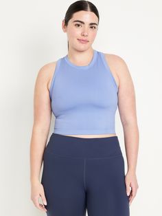 rib-knit panels at sides and back crew neck racerback go-dry wicks moisture fitted hits at waist models are approx.  5'9" and wear sizes s (size 4), l (size 12) and xl (size 18)machine wash according to the care instruction label Blue Activewear With Seamless 4-way Stretch, Blue Seamless Activewear With 4-way Stretch, Solid Racerback Go-dry Activewear, Solid Racerback Activewear With Go-dry, Solid Color Racerback Activewear With Go-dry, Solid Go-dry Racerback Activewear, Compression Racerback Tops For Light Sports, Sporty Compression Tank Top In Solid Color, Sporty Compression Solid Color Tank Top