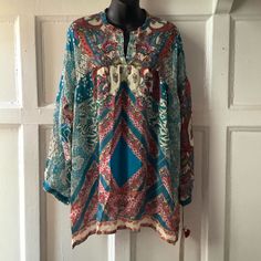 Blouse Is New - Never Used - No Stains, Rips, Tears Or Snags Measures 28 Inches Armpit To Armpit Sleeve Length 18 Inches Length 32 Inches At Longest Point Patterned Long Sleeve Boho Print Blouse, Fall Bohemian Split Neck Tops, Multicolor Long Sleeve Bohemian Blouse, Multicolor Bohemian Long Sleeve Blouse, Blue Long Sleeve Blouse With Boho Print, Multicolor Bohemian Tunic Peasant Top, Spring Folk Blouse With Boho Print, Bohemian Multicolor Long Sleeve Blouse, Bohemian Multicolor Peasant Tunic Top