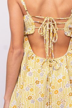 The Drew Olive Floral Babydoll Cami Mini Dress is here for sunshine and fun summer days! Olive, mustard yellow, ivory, and blue floral fabric form this cute floral bralette babydoll dress with cami straps and a bralette cutout bodice. The attached mini skirt falls from an empire waist. A ruffle back with ties finishes the look! Style with cute sandals for a fun summer look! DETAILS & CARE 100% Polyester. 100% Polyester Lining. Machine wash cold. Imported. Babydoll Cami, Blue Floral Fabric, Cami Mini Dress, Boho Pink, Breezy Dress, Mini Cami Dress, Pink Boho, Cute Sandals, Fall Skirts