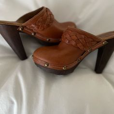 Designed By Sbicca, These Slip On Heels Are A Timeless Favorite. Crafted With Genuine Leather, A Comfy Memory Foam Insole, And A Tapered Heel. Never Worn! 4" Heel. Genuine Leather. So Comfortable And Looks Fantastic With Pants, Shorts Or Dresses! Casual Heels With Wooden Heel And Almond Toe, Casual Almond Toe Heels With Wooden Heel, Brown Leather Clogs With 4-inch Heel, Casual Mules With Wooden Heel And Almond Toe, Brown Heels With Woven Sole And Round Toe, Brown Woven Sole Slip-on Heels, Brown Slip-on Heels With Woven Sole, Chic Brown Almond Toe Clogs, Brown Woven Sole Mules With Round Toe