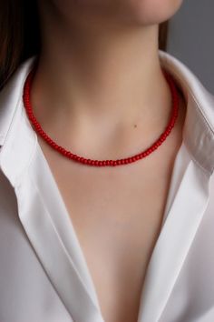 Bright minimalist beaded choker with deep red czech glass beads, strong double nylon thread, silver tone clasps, silver tone lobster clasp and stainless steel adjustable length chain. Perfect for everyday wear or a pretty gift for someone special! You can wearing it with other chokers, chain necklaces or alone! Total length of necklace is 42.5 cm or 16.7 inches and 4.5 cm of adjustable length chain. NOTE: in my store you can also find similar necklaces in other colors as in the last photo. The p Red Minimalist Beaded Necklace With Tiny Beads, Minimalist Red Beaded Necklaces, Minimalist Red Beaded Necklace With Tiny Beads, Minimalist Red Beaded Necklace, Adjustable Red Choker With Tiny Beads, Adjustable Single Strand Red Beads, Adjustable Red Beaded Necklace With Lobster Clasp, Red Minimalist Beaded Necklace, Bright Minimalist