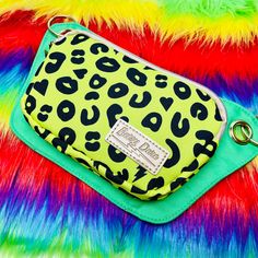 With an eye-popping bright yellow background on the main pouch, a bright grass green on the back panel, and a matching green liner, this bag puts color front and center. Our electric leopard print features fun shapes like lightning bolts, lips, and hearts sprinkled among the spots. The best part is our unique gold chain belt/strap — now with a black pleather section for more comfort and adjustability —that lets the Lisa easily convert from a crossbody bag to a size-inclusive fanny pack (fitting Unique Gold Chain, Crossbody Belt Bag, Gold Chain Belt, Heart Sprinkles, Earbuds Case, Lightning Bolts, Convertible Bags, Grass Green, Chain Belt