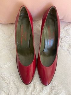 Fun and funky 80's Charles Jourdan pumps in a two-tone wedge heels.  Great color of red with brown wedge.  Super condition.  The bottoms of shoes show very little wear. One shoes does have a scuff on the bottom.   Exterior of shoes are in excellent condition. Size:   Narrow - The inside of the shoes has this number37X 7 2A 669369MR     Shoes are made in France.   Smoke Free Home. Please review all pictures as they are part of the description.  If you have any questions, please ask before purchasing.   For more treasures, please visit my Etsy shop: https://www.etsy.com/shop/PIECESOFOLD4U For other fun vintage finds, take a peek at my daughter's and my aunt's Etsy Shops.  https://www.etsy.com/shop/5BARESVINTAGEFINDS https://www.etsy.com/shop/2SISTERSTREASURES4U Charles Jourdan, Galveston Tx, Womens Pumps, Brown Wedges, Shoe Show, Galveston, Red Brown, Womens Heels, Vintage Finds