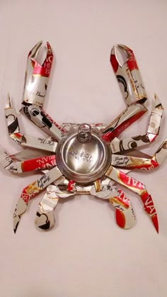 a crab made out of cans and other items