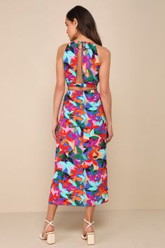 Any vacay where you bring along the Lulus Gorgeous Destination Blue Multi Floral Two-Piece Wrap Midi Dress is bound to be an ultra-stylish time! Lightweight woven fabric, with an extra colorful floral-inspired design throughout, shapes this trendy two-piece dress that features a sleeveless cropped top with a modified halter neckline (with an adjustable tie at the back), a flirty cutout at the back, and an elasticized hem. The matching skirt boasts a high, elasticized waistband and a figure-skimming, wrap silhouette that secures at the side with a tying detail and finishes at a midi hem. Fit: This garment fits true to size. Length: Mid-calf length. Size medium Bust: Great for any cup size. Waist: Fitted - elastic waist allows stretch. Hip: Loosely Fitted. Undergarments: May be worn with an Wedding Casual Outfit, Wedding Casual, Floral Two Piece, Midi Wrap Dress, Wedding Top, Wrap Midi Dress, Sleeveless Crop Top, Blue Midi Dress, Cutout Dress