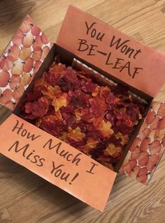 a box that has been decorated with flowers and writing on the inside, which reads you won't be - leaf how much i miss you?