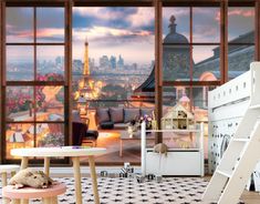 a living room filled with furniture and windows overlooking the eiffel tower in paris