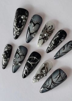 ✴ Hand painted ✴ Reusable ✴ High Quality ✴ Available in different colors, sizes and shapes (on request) IMPORTANT - PLEASE READ BEFORE PURCHASING All sets are made with GEL nail polish. These nails are reusable, if you take it off right. For instruction, please message me Each set comes with 10 handmade press on nails, a mini file, a mini buffer, a cuticle stick, a nail glue, Double Sided Adhesive Tape Glue, Alcohol Pad 1. Measurements Please measure your own nail and find your size from our picture guide. We totally can do custom size as your request, just help us to add your nail size in mm or your nail tips number, and shape, we will process accordingly without any extra charges. Message me if you are unsure about the size/length. We DO NOT accept cancelation for sizing/length problems. Ongles Goth, Fake Nails Designs, Korean Nail Art, Chrome Nails Designs, Punk Nails, Korean Nails, Goth Nails, Grunge Nails, Acrylic Press On Nails