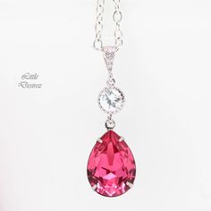 "Hot Pink Necklace Swarovski Crystal Pink Necklace Bridal Teardrop Necklace Bridesmaid Necklace Sparkly Cubic Zirconia Pink Magenta Elegant and romantic pink necklace made with gorgeous 18x13mm genuine Swarovski teardrop pear shaped Rose Pink fancy stone. Suspended from Hypoallergenic Rhodium plated and tarnish resistant beautiful Cubic Zirconia embellished bail with the help of sparkling cubic zirconia connector. The pendant drop is 1 1/2\" long. Finished with a sterling silver clasp and chain, Rose Pink Necklace, Hot Pink Necklace, Pink Crystal Earrings, Clear Crystal Necklace, Necklace Swarovski, Fancy Stones, Pink Swarovski, Necklace Bridal, Jewelry Bridesmaid