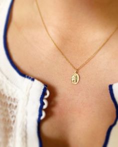 Saint Christopher is meant to keep you safe on your journeys whether that's a trip you've got planned or your journey through life.  This petite pendant measures 9 mm x 12 mm and is available on 16 inch, 18 inch (standard length) or 20 inch chain (for custom lengths, please inquire).  This necklace is 14K gold-filled to American standard so it's shower safe and great for everyday wear. Makes a beautiful gift to mark a special milestone.  Model is also wearing our 20mm 14K gold-filled hoops (also St Christopher Necklace The Catholic Company, Gold St Christopher Necklace, Spiritual Gold Jewelry For Everyday Use, Necklace Drawing, St Christopher Necklace, Blue Choker, Gold Heart Locket, Bohemian Style Jewelry, Gray Necklace