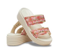 Crocs Brooklyn Woven Low Women's Wedge Sandal Cool and comfy is your summer motto in the Brooklyn Woven Low women's wedge Sandal from Crocs. With a flexible Matlite™ upper featuring a two-strap design that's easily adjustable for a great fit, these Sandalsalso have a deep heel cup and massaging insole for amazing support. The LiteRide™ foam footbed offers innovative cushioning, while the platform and woven-styled molded wedge enable all-day comfort. Synthetic upper  Slip-On  EVA Pink Casual Wedge Sandals With Adjustable Straps, Casual Adjustable Pink Wedge Sandals, Casual Pink Adjustable Wedge Sandals, Crocs Brooklyn, Rack Room Shoes, Rack Room, Womens Sandals Wedges, Weave Style, Buckle Sandals