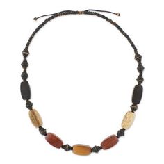 Exotic beads crafted from assorted woods and coconut shell line a black cord in this beaded necklace. From artisan Shutikarn Kantung the long necklace offers a natural appeal with its rugged design. Shell Beaded Necklace, Shell Beads Necklace, Coconut Wood, Wood Bead Necklace, Fiber Jewelry, Long Beaded Necklace, Buy Wood, Creating Jewelry, Coconut Shell