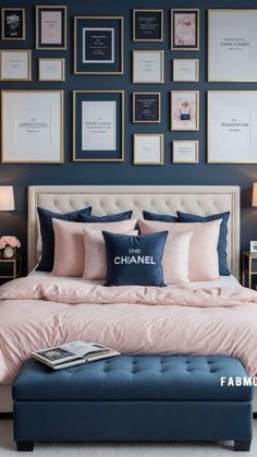 a blue and pink bedroom with pictures on the wall