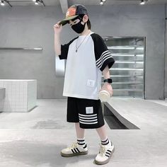 Elevate your little boy's back to school style with our casual contrast striped T-shirt and shorts set. White Casual Shorts For School, Casual White Shorts For School, Sporty Cotton School Sets, Sporty T-shirt With Three Stripes For Streetwear, Summer Streetwear T-shirt With Contrast Stripes, Striped Short Sleeve T-shirt For Streetwear, Cotton Three Stripes T-shirt For Streetwear, Short Sleeve Sports T-shirt With Contrast Stripes, Kids Fashion Clothes