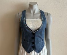 "Women's Vest Sequin Denim Vest Blue Denim Vest Jean Waistcoat Fitted Womens Sleeveless Denim Jacket  Measurements (lying flat): Length(back): 15\"/ 38 cm Pit to pit: 16\"/ 41 cm Waist: 14.5\"/ 37 cm Please check measurements to insure a proper fit. Remember to allow yourself some extra room for movement. You can compare these with something from your closet that fits you well. Please convo me if you need additional measurements. Condition: great Vintage Condition N.B. Color may slightly differ Jean Waistcoat, Sleevless Jacket, Sleeveless Denim Jacket, Denim Couture, Blue Jean Vest, Jean Vest, Light Blue Jeans, Vest Outfits, Extra Room