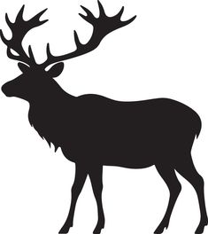 the silhouette of a deer with large antlers on it's back legs is shown