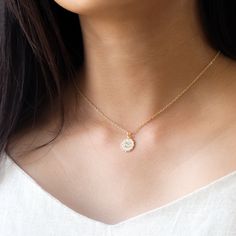 Our dainty zodiac coin necklace features a round scalloped pendant with a zodiac sign on it. …………………………………. Details: Pendant is Gold or Silver Plated over Brass measuring 12mm Chain is 14k Gold/Silver Plated, Gold Filled or Sterling Silver Average necklace length is 18" About Your Jewelry If you are not wearing your jewelry it is best to store it in a cool, dry place such as your gift box that is included in your ord Round Sterling Silver Medallion Necklace, Delicate Coin Pendant Jewelry, Delicate Tarnish Resistant Medallion Jewelry, Delicate Round Coin Pendant Jewelry, Delicate Tarnish-resistant Medallion Jewelry, Dainty Necklaces With Coin Pendant, Dainty Gold-plated Jewelry With Coin Pendant, Sterling Silver Round Coin Necklace, Dainty White Gold Medallion Jewelry