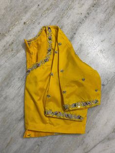 Hand embroidered ready made saree blouse / crop top/stitched saree blouse usa / yellow saree blouse/modern blouse/zardosi blouse/shirt sleeve saree blouse/cotton  silk blouse/ maggam work blouse      Well..!! we understand that you may not get in your desired size/pattern, here you go with customization according to your size/pattern which we can deliver in 1-2 weeks of time period !!      Here is a beautiful Hand embroidered zardosi work crop top / blouse in yellow color that has curved neck wi Luxury Semi-stitched Yellow Blouse, Yellow Dola Silk Set With Mirror Work, Yellow Raw Silk Traditional Wear With Mirror Work, Yellow Traditional Wear With Mirror Work In Raw Silk, Yellow Mirror Work Sets In Dola Silk, Yellow Raw Silk Set With Mirror Work, Fitted Yellow Pre-draped Saree With Mirror Work, Yellow Pre-draped Saree With Unstitched Blouse For Designer Wear, Fitted Yellow Pre-draped Saree With Dori Work