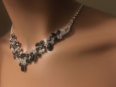 "Black Bridal jewelry set, Black , Silver Necklace with Earring, wedding jewelry set, Bridesmaid Crystal Rhinestone Jewelry, Teardrop Crystal Floral Rhinestone Necklace Color : Black, Silver Necklace Size : 14\" + 5.5\" L Decor Size : 1.5\" L Earring Size : 1.75\" L Please contact us for any special custom order ." Black Crystal Jewelry Sets For Wedding, Elegant Black Jewelry Set For Wedding, Black Rhinestone Jewelry For Wedding, Black Rhinestone Wedding Jewelry, Black Cubic Zirconia Necklace For Wedding, Elegant Black Bridal Necklace For Formal Occasions, Black Jewelry With Sparkling Stones For Wedding, Black Sparkling Stones Jewelry For Wedding, Black Sparkling Stones Wedding Jewelry