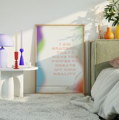 a bedroom with a bed, nightstand and art on the wall