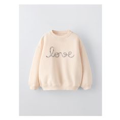 “LOVE” FLOWER SWEATSHIRT Trendy Long Sleeve Sweater With Letter Embroidery, Trendy Long Sleeve Sweatshirt With Letter Embroidery, Beige Letter Print Sweater For Spring, Cream Long Sleeve Letter Print Sweatshirt, Cream Long Sleeve Sweatshirt With Letter Print, Cute Cream Cotton Sweatshirt, Cream Letter Print Top For Winter, Cute Embroidered Long Sleeve Sweatshirt, Cute Long Sleeve Embroidered Sweatshirt