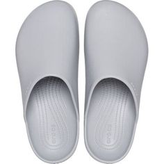 The Dylan Clog melds the classic styling of mules with the unbelievable comfort of Crocs' classic Croslite material. The soft cushioning of the footbed keeps our feet fresh for long walks along the boardwalk or hours of chores around the house and backyard. The easy slip-on style stays next to the door so we can slide them on as we head out of the house, but there's no guarantee we'll want to take them off when we get back home. Comfortable Closed Toe Synthetic Slides, Comfortable Synthetic Closed Toe Slides, Solid Color Slip-on Clogs With Rubber Sole, Classic Flat Clogs With Rubber Sole, Comfortable Solid Color Slides With Rubber Sole, Comfortable Flat Clogs With Rubber Sole, Classic Closed Toe Clogs With Textured Footbed, Casual Solid Clogs With Cushioned Footbed, Classic Slip-on Clogs With Textured Footbed