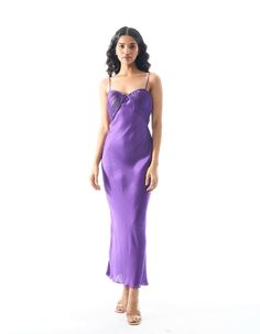 Modal satin slip dress with ruched top detailWear her out a few nights and you’ll soon realise that the Bella Donna Dress is a beauty you can count on. The satin slip dress features an alluring ruched neckline, and comes in an enlivening, vivid, violet hue. Tailored to a slim-fit silhouette with a side-zipper closure to keep you snug.Product details: Material/Fabric - Modal Satin Fit- Slim fit Closure - Side zipper Size chart: SIZE 6 8 10 12 14 16 18 20 (XXS) (XS) (S) (M) (L) (XL) (XXL) (XXXL) B Elegant Slip Dress With Ruched Back For Date Night, Pre-draped Satin Dress With Spaghetti Straps, Date Night Modal Satin Slip Dress With Spaghetti Straps, Date Night Slip Dress With Spaghetti Straps, Silk Dress With Ruched Back For Date Night, Ruched Slip Dress With Sweetheart Neckline For Date Night, Ruched Sleeveless Silk Evening Dress, Modal Satin Bias Cut Slip Dress For Date Night, Sleeveless Ruched Silk Dress For Evening