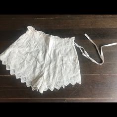 Free People High Waisted Lace Shorts With Ruffles And Waist Tie. Never Worn, Perfect Condition. Cream Color. Very Feminine And Fun. Vintage Bottoms With Lace Trim For Summer, Vintage Lace Trim Bottoms For Summer, Fitted Summer Bottoms For Daywear, Summer Daywear Bloomers With Elastic Waistband, Daywear Bloomers With Elastic Waistband, Summer Bloomers With Elastic Waistband For Daywear, Summer Daywear Shorts With Lace Trim, Summer Lace Trim Shorts For Daywear, Fitted Short Summer Bloomers