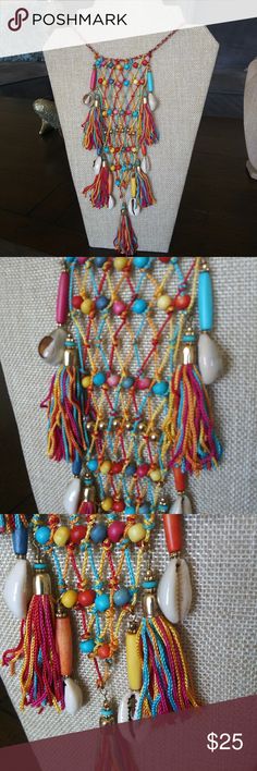 Beautiful Colorful Tribal Necklace. Tribal necklace with shells and tassels adjustable size. Great for summer. One of a kind. New MIA Collection Jewelry Necklaces Multicolor Bohemian Jewelry For Summer, Bohemian Multicolor Beaded Necklaces For Vacation, Multicolor Handmade Jewelry For Vacation, Colorful Bohemian Necklaces For Vacation, Unique Multicolor Beaded Necklaces For Beach, Beach Necklace With Large Multicolor Beads, Colorful Bohemian Necklace For Vacation, Multicolor Long Necklace For Summer, Hippie Multicolor Beach Necklaces