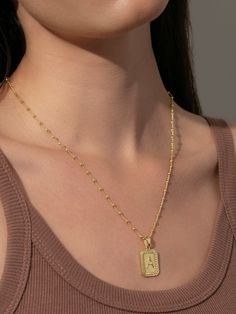 Show off your initial - or your loved one’s - for a personalized statement. Our Sur Necklace is the iconic Uncommon James initial necklace that everyone should have in their jewelry collection. Choose from silver or gold, find your letter, and then make this pendant necklace yours! Letters Available: Gold: A, D, E, H, I, J, K, L, M, N, O, R, S, T Silver: A, D, E, J, K, L, M, R, S, T For a fully personalized look, shop our Initial Jewelry. Everyday Necklace With Rectangular Pendant, Minimalist Rectangular Pendant Initial Necklace, Minimalist Personalized Initial Necklace, Personalized Initial Necklace With Rectangular Pendant, Tarnish Resistant Gold Initial Necklace, Tarnish Resistant Necklace With Rectangular Pendant, Everyday Jewelry With Initials On Rectangular Pendant, Rectangular Pendant Jewelry With Initials For Everyday, Minimalist Initials Square Pendant Necklace