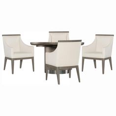 an image of a dining room setting with chairs and table in white leather upholstered