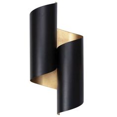 a black and gold wall light on a white background