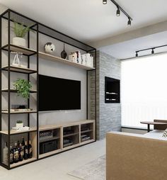 a living room with a large flat screen tv mounted to the side of a wall