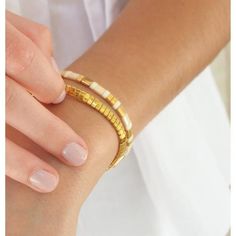 Tilu Bracelet - Fortnox Elegant Gold Stretch Bracelet With Tiny Beads, Modern Gold Jewelry With Tiny Beads, Handmade Elegant Heishi Beads Bracelets, Elegant Heishi Bead Bracelets With Tiny Beads, Elegant Flexible Hand-strung Stretch Bracelet, Elegant Hand-strung Stretch Bracelet, Handmade Flexible Gold Bracelet, Gold Handmade Flexible Bracelet, Gold Beaded Flexible Stretch Bracelet