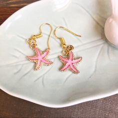 (Nwt) Gold And Pink Star Fish Earrings Fashion Jewelry Pink Starfish Jewelry For Gift, Pink Star Jewelry With Starfish Charm, Pink Starfish Charm Jewelry, Pink Star-shaped Jewelry With Starfish Charm, Pink Dangle Earrings For Beach, Pink Beach Jewelry With Matching Earrings, Pink Jewelry With Matching Earrings For Beach, Handmade Pink Star-shaped Jewelry, Fish Earrings