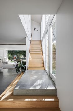 the stairs are made of concrete and wood