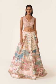 This linear patchwork embroidered lehenga is embellished with sequin, cutdana and swarovski. It is paired with classic blouse and net dupatta with thread and bead work. Semi-stitched Hand Embellished Raw Silk Lehenga, Designer Hand Embellished Silk Lehenga, Hand Embellished Semi-stitched Silk Sets, Designer Hand Embellished Raw Silk Choli, Designer Wear Hand Embellished Raw Silk Choli, Bollywood Style Hand Embellished Chanderi Set, Bollywood Style Hand Embellished Silk Lehenga, Wedding Lehenga Hand Embellished In Multicolor, Multicolor Hand Embellished Lehenga For Reception