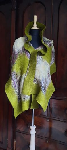 Each piece a fabulous and unique work of art handcrafted in Turkey.  100% Merino Wool felted onto beautifully printed silk creating a stand-out scarf that can add drama to any outfit. Due to the handmade nature of this item measurements are a rough guide. Green Bohemian Shawl Wrap, Green Bohemian Scarf Wrap, Green Bohemian Wrap Scarf, Green Silk Shawl Scarf, Green Hand Dyed Bohemian Scarf, Artistic Hand-dyed Green Scarves, Green Bohemian Silk Shawl, Bohemian Green Silk Scarves, Green Silk Bohemian Scarves