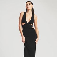 New With Tags Cutout V-neck Evening Dress, Black V-neck Maxi Dress With Cutout, Black Cutout V-neck Maxi Dress, Chic Black Evening Dress With Flattering Silhouette, V-neck Cutout Midi Dress For Night Out, V-neck Cutout Maxi Dress For Party, Formal Black Maxi Dress With Cutout, Formal V-neck Dress With Cutout, Elegant Cutout Dresses For Gala