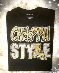 Choppa Style Tee Shirt comes in Fitted, Women's, and Unisex Tees ►Unisex fit is larger than an average shirt, so we suggest ordering the women's a size down from your normal size. ►Please see listing photos for sizing info!! Retail fit Tear-away label Side seamed Shoulder taping Solid Colors: 4.2-ounce, 100% Airlume combed and ring spun cotton, 32 singles Casual Tops With Glitter Print For Streetwear, Fitted Casual Top With Glitter Print, Gold Short Sleeve Tops With Glitter Print, Gold Short Sleeve Top With Glitter Print, Fitted Glitter Tops In Casual Style, Frozen Birthday Outfit, Saints Shirts, Glitter Shirt, Locker Room